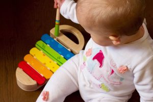 baby with xylaphone