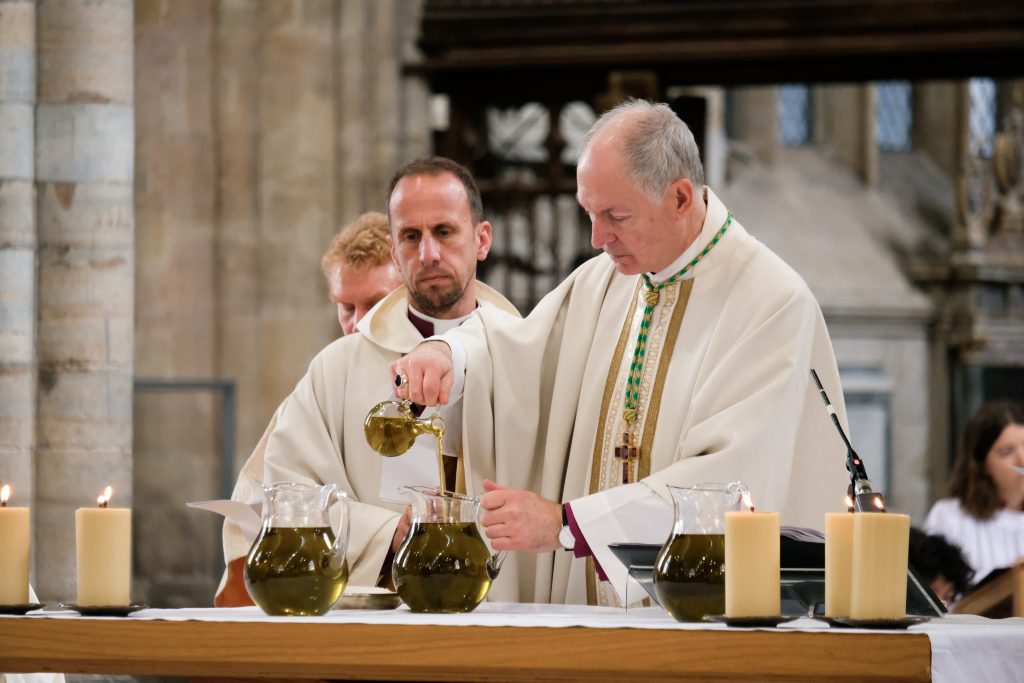Bishop of Exeter prepares holy oils at Chrism Eucharist service